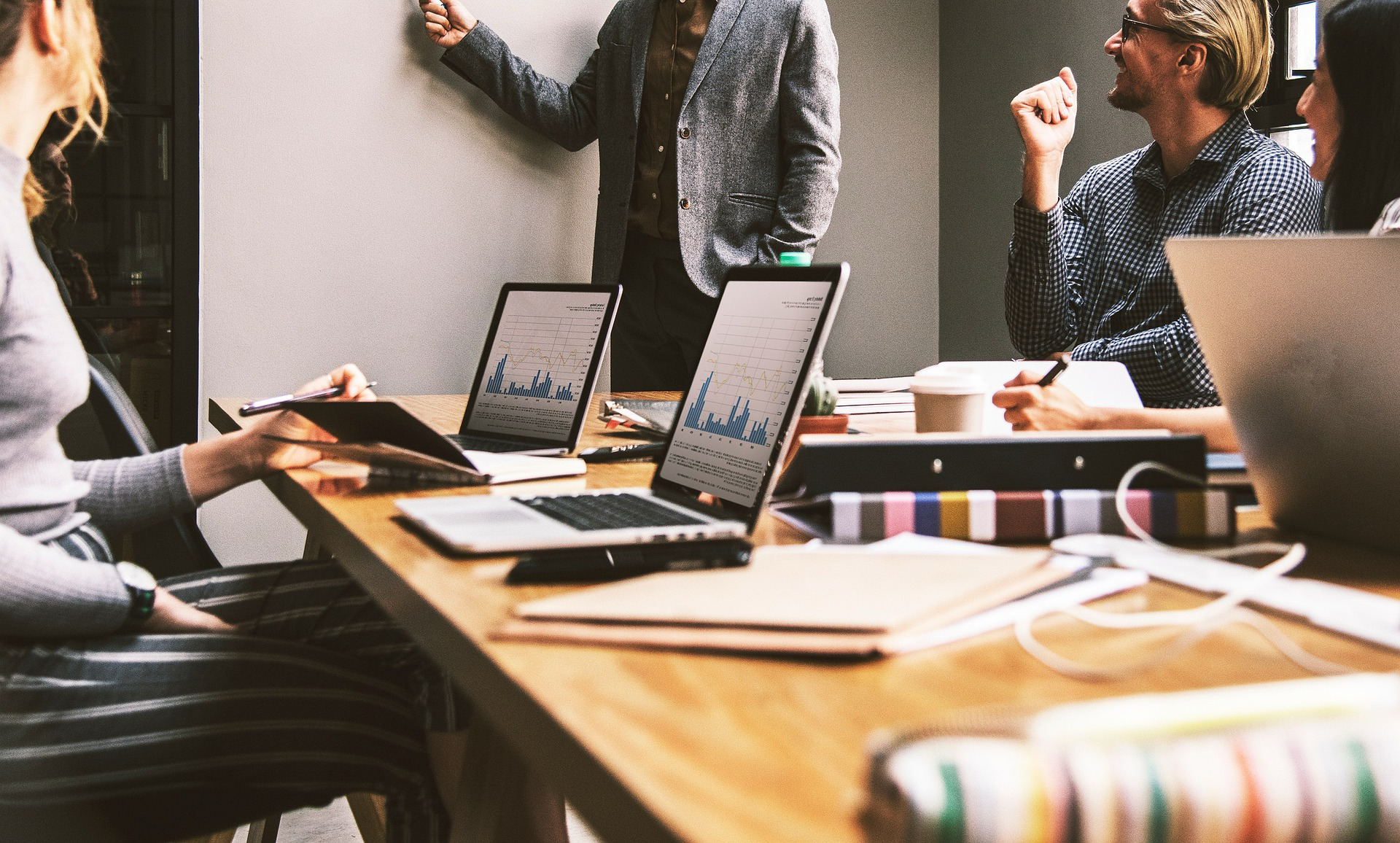 A synchronized team of digital marketing specialists collaborating in a high-tech data environment.
